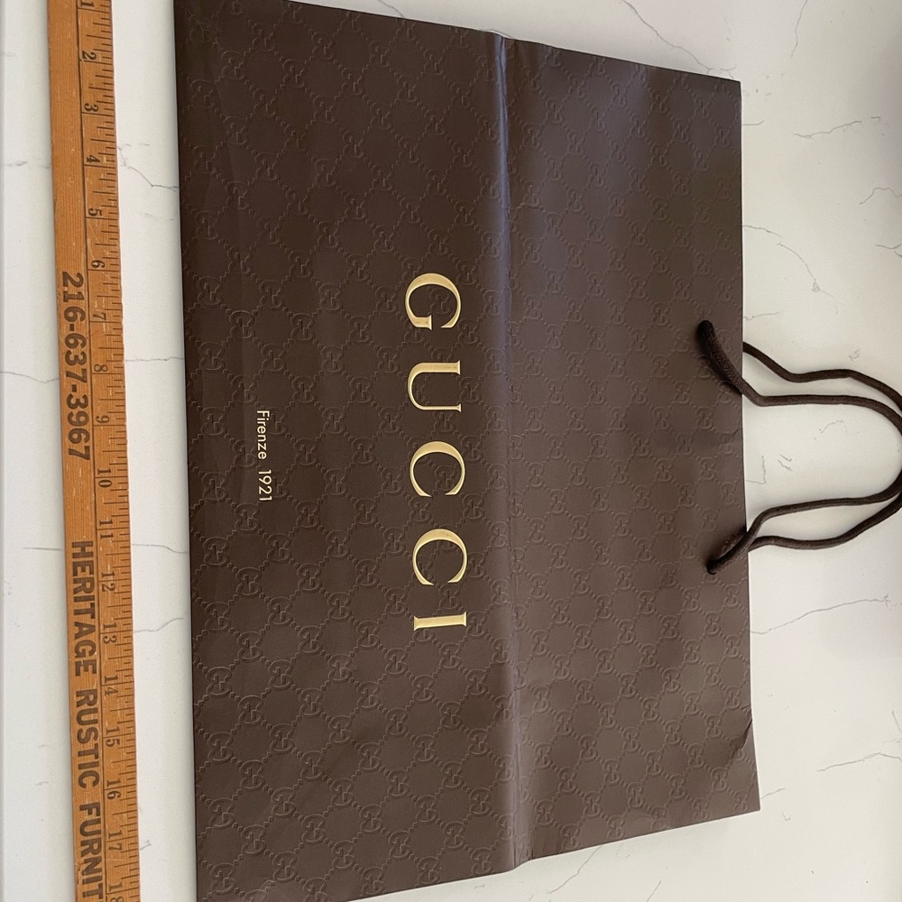 Louis Vuitton , Gucci shopping bags